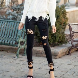 Black jeans with leopard print cut outs